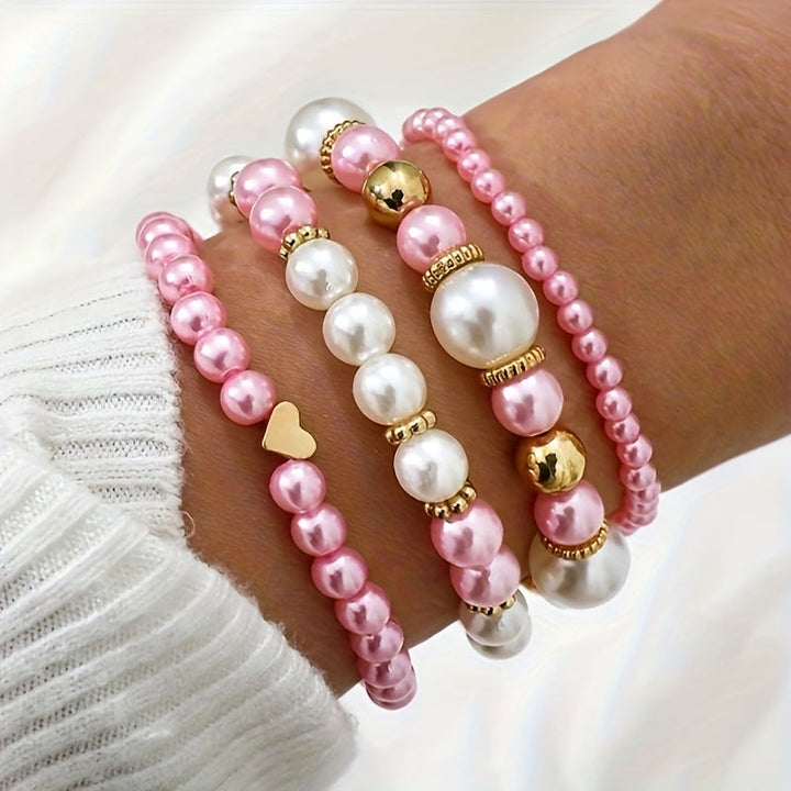 Set di bracciali con perle e cuore