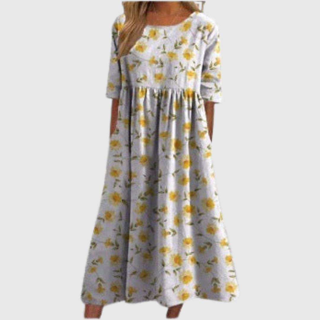 CLARA | ABITO MIDI FLOREALE DALLA LINEA MORBIDA