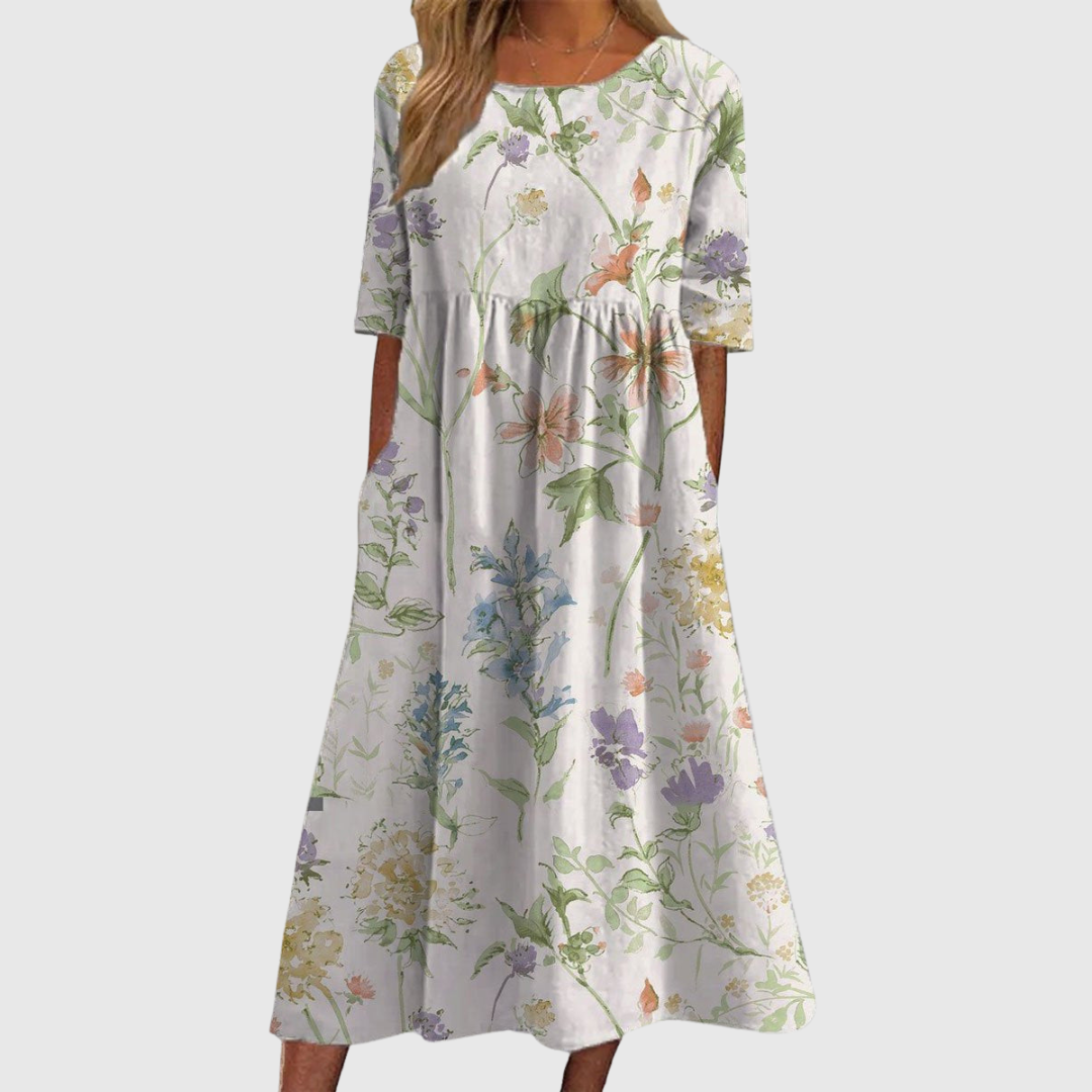 CLARA | ABITO MIDI FLOREALE DALLA LINEA MORBIDA