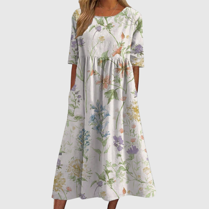 CLARA | ABITO MIDI FLOREALE DALLA LINEA MORBIDA
