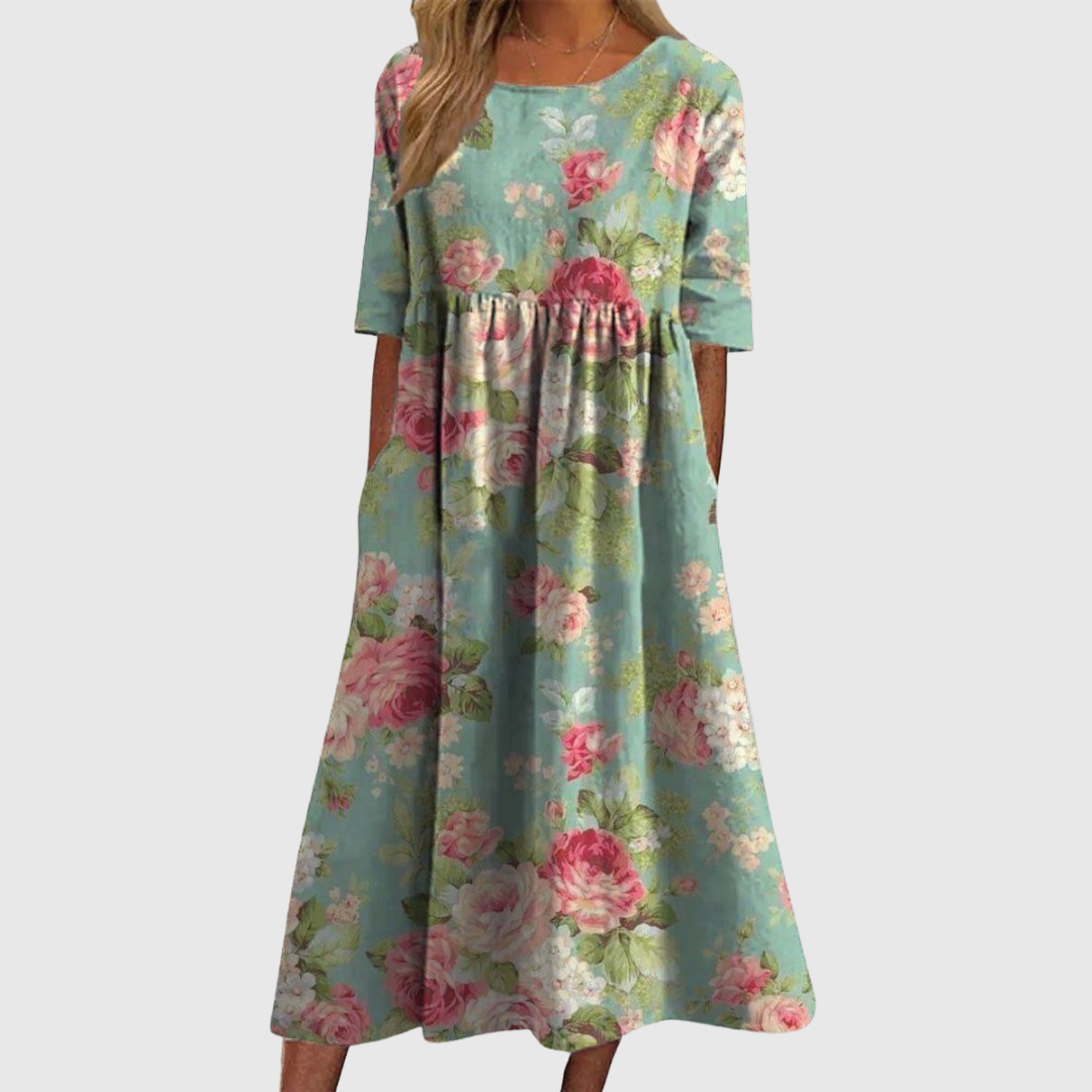 CLARA | ABITO MIDI FLOREALE DALLA LINEA MORBIDA
