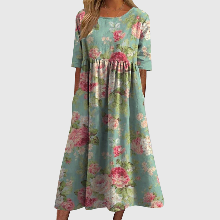CLARA | ABITO MIDI FLOREALE DALLA LINEA MORBIDA
