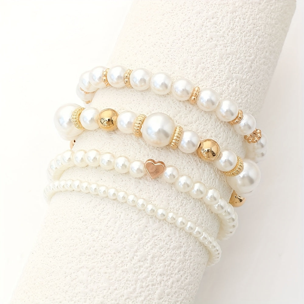 Set di bracciali con perle e cuore