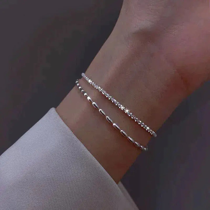 Set di bracciali argentati con zirconia