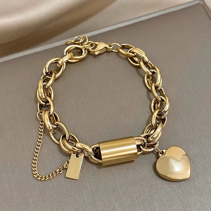 Bracciale dorato a maglie grandi con cuore