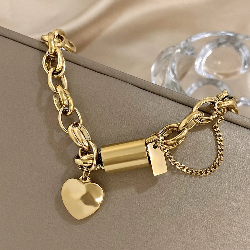 Bracciale dorato a maglie grandi con cuore