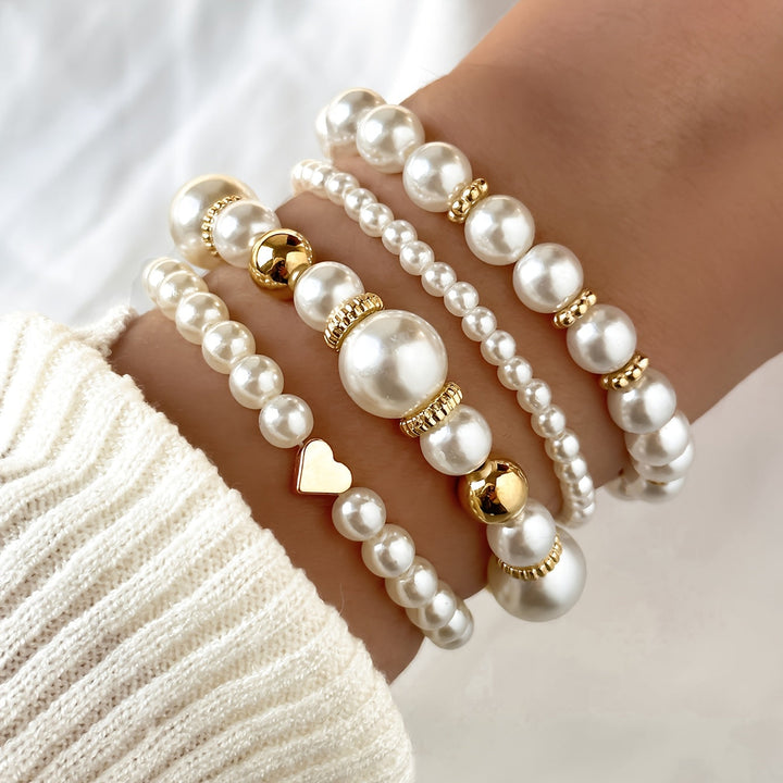 Set di bracciali con perle e cuore
