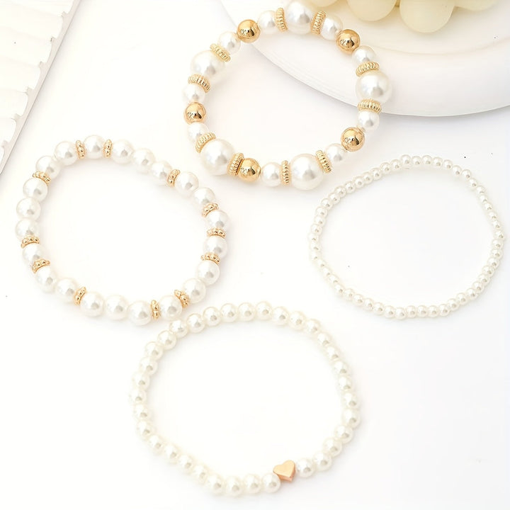 Set di bracciali con perle e cuore