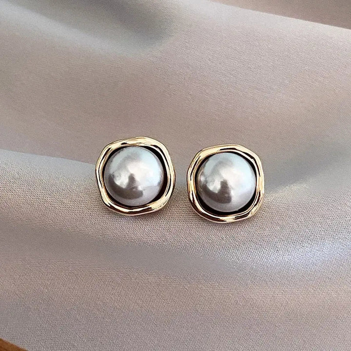 Orecchini con Perla Nera